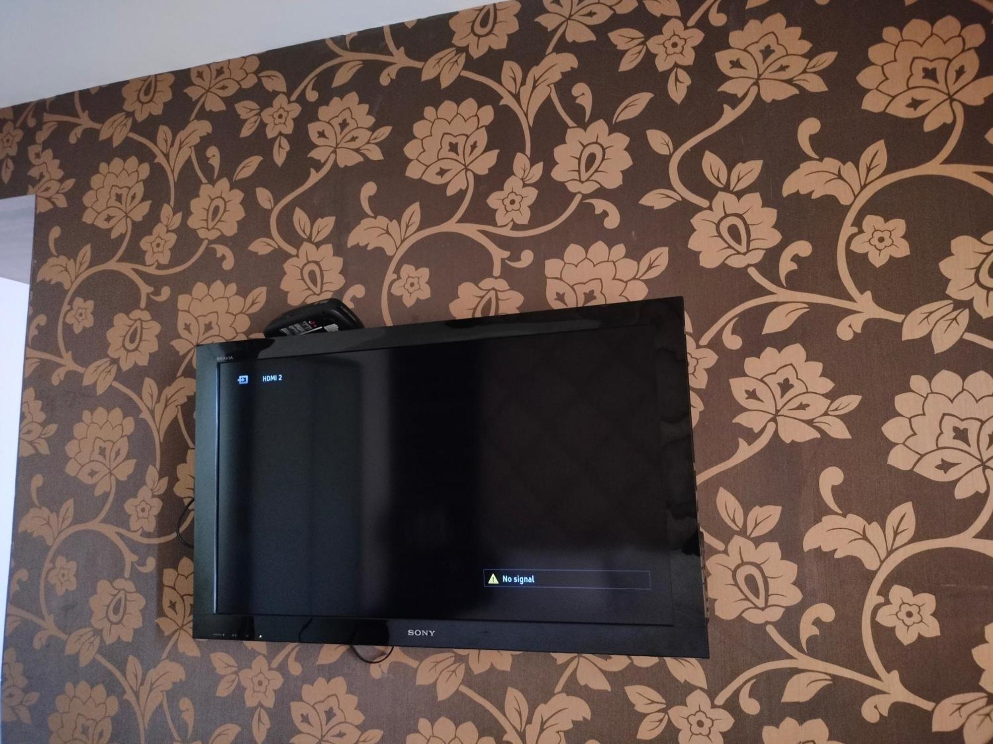Holiday Inn Chandigarh Panchkula, An Ihg Hotel Eksteriør billede A television mounted on a wall